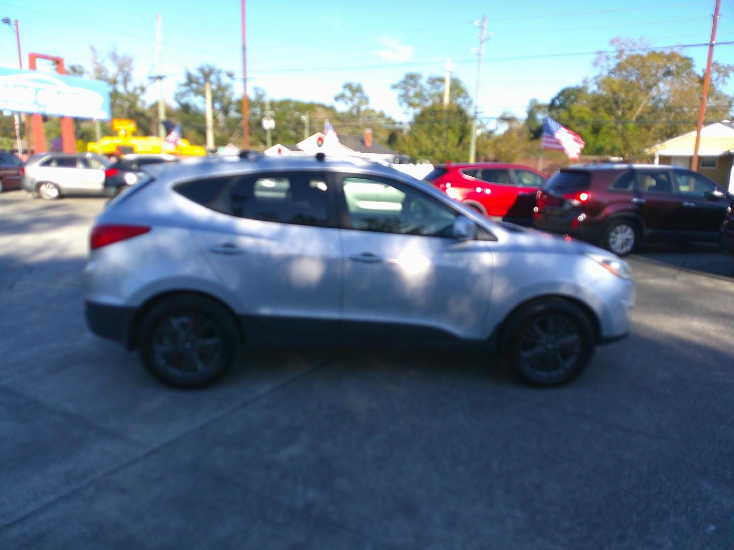 2014 SILVER HYUNDAI TUCSON LIMITED; SE (KM8JU3AG4EU) , located at 10405 Abercorn Street, Savannah, GA, 31419, (912) 921-8965, 31.988262, -81.131760 - Photo#4